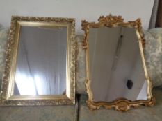 A Victorian style gilt framed mirror together with a further gilt mirror