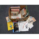 A box containing 20th century books and magazines relating to magic,