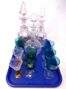 A tray containing three early 20th century decanters with stoppers together with assorted drinking