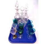 A tray containing three early 20th century decanters with stoppers together with assorted drinking