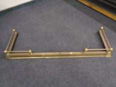 A 19th century brass telescopic fire curb