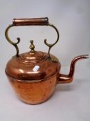 A Victorian copper and brass kettle