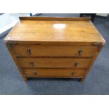 An Edwardian oak chest of three drawers. Width 89 cm x depth 45 cm x height 81 cm.