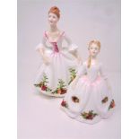 Two Royal Doulton Country Rose figures,