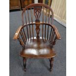 A 19th century elm Windsor armchair