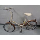 A vintage Phillips Folda folding bike