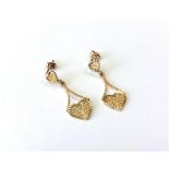 A pair of 9ct gold filigree earrings CONDITION REPORT: 1.