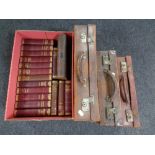 Three vintage leather cases together with a set of sixteen volumes of Dickens,