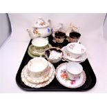A tray containing a Saddler teapot, pair of copper lustre goblets,