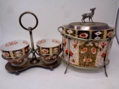 A Davenport pottery Imari patterned biscuit barrel with silver plated lid surmounted by a stag on