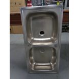 A stainless steel double sink unit, width 86 cm.