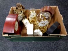 A box containing a quantity of contemporary mantel clocks, anniversary clocks,