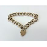 A 9ct gold padlock bracelet CONDITION REPORT: 11.