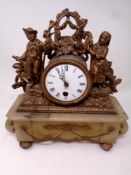 An antique continental spelter and marble mantel clock