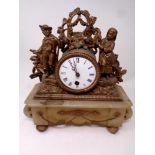 An antique continental spelter and marble mantel clock