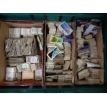 A crate containing a large quantity of cigarette and tea cards to include Ringtons, Brook bond,