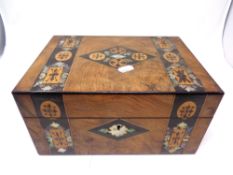A Victorian inlaid walnut vanity case with fitted interior