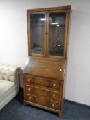 An Edwardian oak bureau bookcase