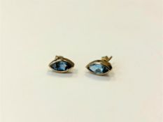 A pair of 9ct gold blue topaz earrings CONDITION REPORT: 1.