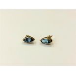 A pair of 9ct gold blue topaz earrings CONDITION REPORT: 1.