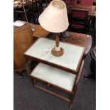 A 20th century melamine topped oak trolley together with a standard lamp