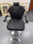 A gas lift barber's armchair