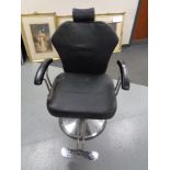 A gas lift barber's armchair