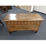 A 19th century oak coffer,