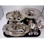 A tray containing assorted antique and later plated wares including candlesticks, cruet dish,