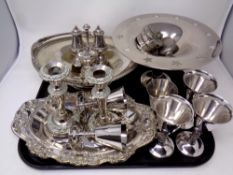 A tray containing assorted antique and later plated wares including candlesticks, cruet dish,