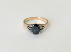 A 14ct gold sapphire and diamond ring, size N CONDITION REPORT: 2.