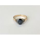 A 14ct gold sapphire and diamond ring, size N CONDITION REPORT: 2.