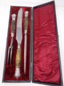 A three piece 19th century carving set in fitted case