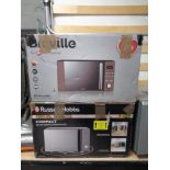 Two boxed microwaves by Russell Hobbs and Breville