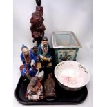 A tray containing oriental wares to include carved hard wood figural table lamp,