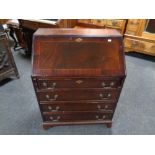 A reproduction inlaid mahogany bureau (as found)