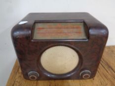 An early 20th century bush Bakelite cased valve radio