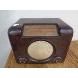 An early 20th century bush Bakelite cased valve radio