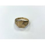 A 9ct gold signet ring, size T CONDITION REPORT: 6.