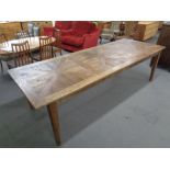 A French style 8' farmhouse kitchen table CONDITION REPORT: Of recent manufacture.