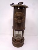An E Thomas and Williams brass miner's lamp