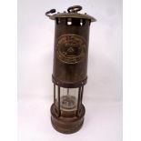 An E Thomas and Williams brass miner's lamp