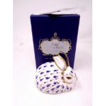 A Royal Crown Derby rabbit paperweight with gold stopper, boxed.