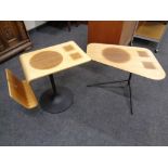 A retro style shaped plywood occasional table with magazine rack on pedestal stand together with a