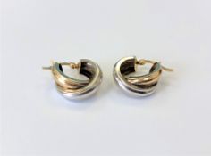 A pair of 9ct gold two-tone earrings CONDITION REPORT: 2.