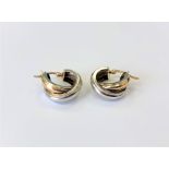 A pair of 9ct gold two-tone earrings CONDITION REPORT: 2.