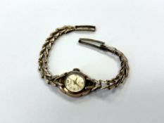 A lady's 9ct gold wristwatch on 9ct gold bracelet CONDITION REPORT: 12.
