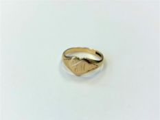 A 9ct gold heart shaped ring,
