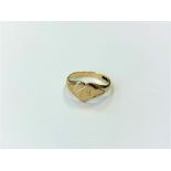 A 9ct gold heart shaped ring,