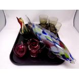 A tray containing antique and later glassware to include cranberry glass jug and heart shaped dish,